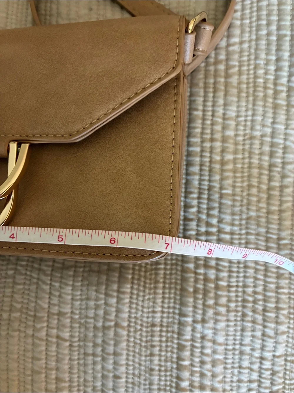 Stylish Tan Crossbody Bag with Gold Accent Hardware